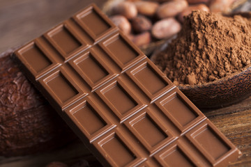 Cocoa pod and chocolate bar and food dessert background