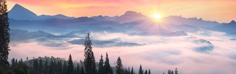 Foggy sunrise in the Carpathian mountains