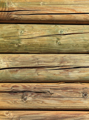 Wooden wall made of logs background