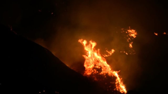 Night shot from the recent fires in Southern California valley. This clip was taken near Magic Mountain in Valencia, CA. HD 1080.