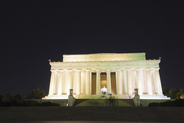 Grand night-time view of the ceremonial approach up towards the neoclassical temple, the Lincoln Memorial, National Mall & Memorial Parks, Washington DC