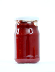 Tomato sauce jar on white background