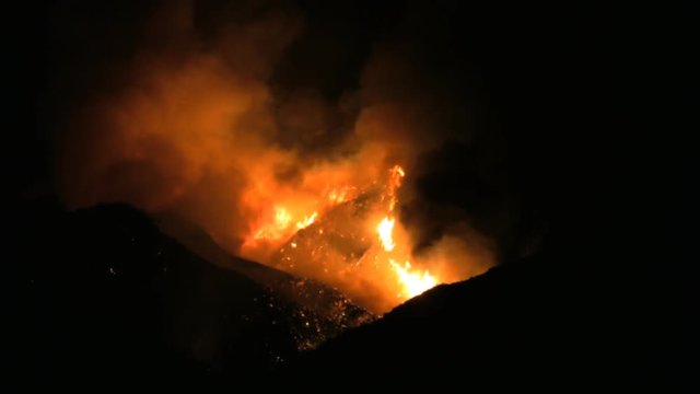 Night shot from the recent fires in Southern California. This clip was taken near Magic Mountain in Valencia, CA. HD 1080.