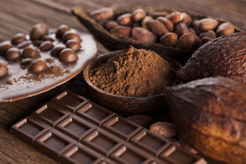 Chocolate bar, candy sweet, dessert food on wooden background