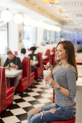 Young woman in diner