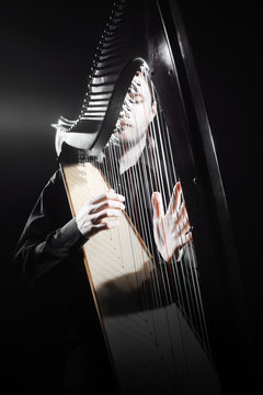 Harp player. Classical musician
