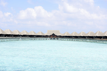 houses on piles on sea. Maldives