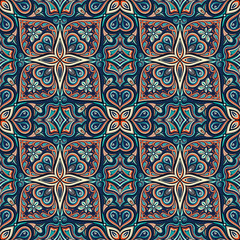 Seamless pattern with stylized flowers. Ethnic background.