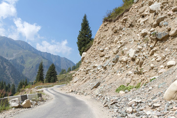 rockfall on the road in the mountains