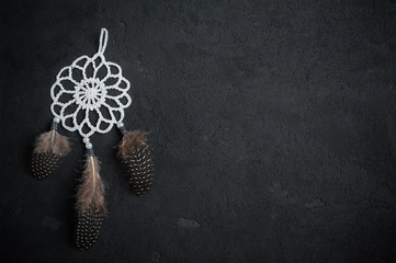 Dream catcher on a black background