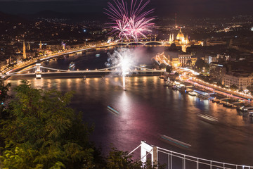 Fototapeta na wymiar Aerial view of fireworks above Danube river next to Chain Bridge and Margit bridge