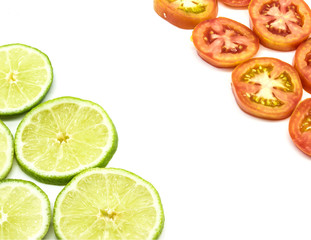 lime and tomato slice on white background