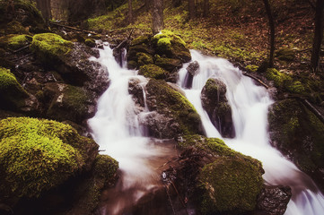 beautiful waterfall in the deep forest. natural background. 