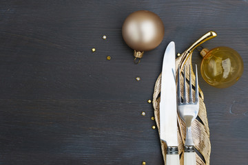 Christmas empty wooden table with knife and fork close up