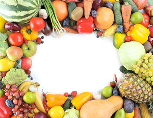Ripe and tasty fruits and vegetables on a white background