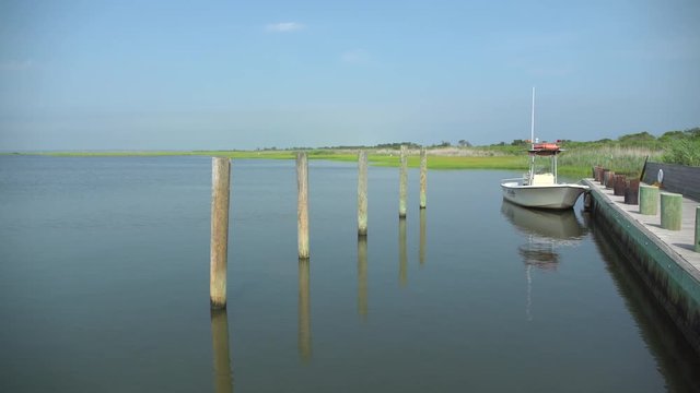Dock at Ho Hum beach on Fire Island on a beautiful sunny day