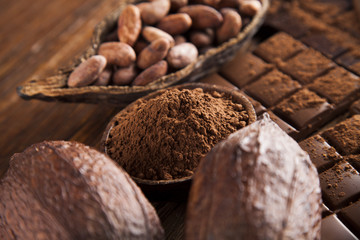 Chocolate bar, candy sweet, dessert food on wooden background