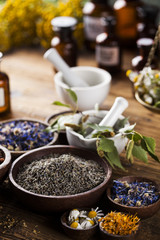 Herbal medicine on wooden desk background