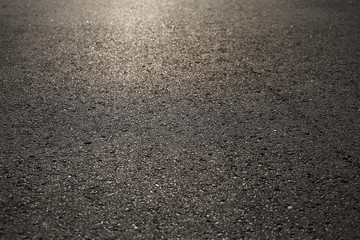 Asphalt road in sunshine