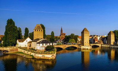 Fototapeta na wymiar Old historical center of Strasbourg. Fortress towers and briges