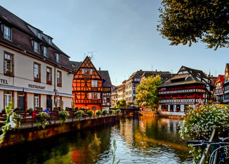 Naklejka premium Old center of Strasbourg. Typical alsacien houses on the river.