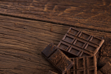 Bars Chocolate , candy sweet, dessert food on wooden background
