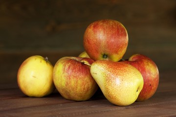 Fototapeta na wymiar apple and one pear 2