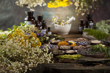 Herbal medicine on wooden desk background
