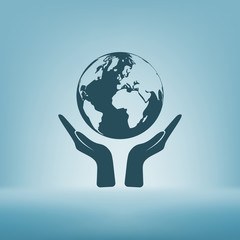 Flat paper cut style icon of two hands holding Earth