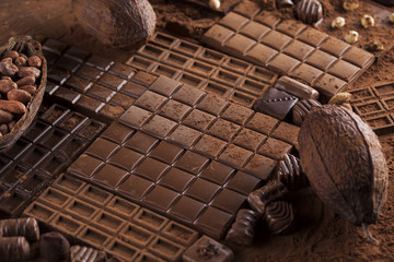 Chocolate sweet, cocoa pod and food dessert background
