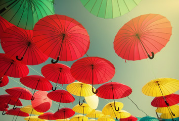 Fototapeta na wymiar colorful yellow, red, blue and green umbrellas 