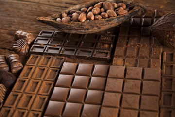 Chocolate sweet, cocoa pod and food dessert background