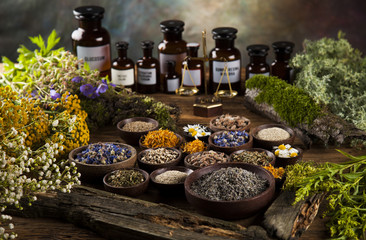 Natural medicine on wooden table background