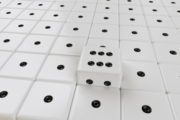 rows of white dices with one ejected