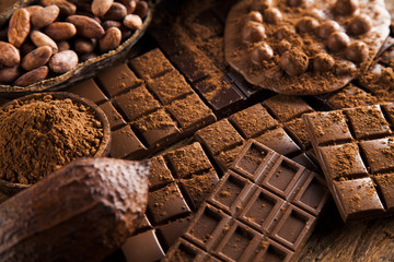 Bars Chocolate , candy sweet, dessert food on wooden background