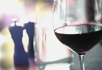 red wine glass on blur dinner table vintage