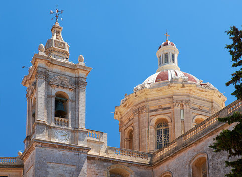 The dome and the bell tower of Collegiate Church of St Paul  in Rabat, Malta