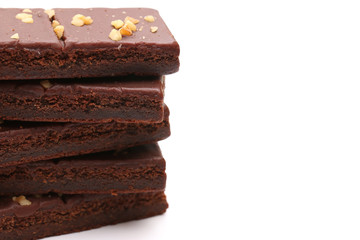 Chocolate Brownies with Nuts on Top on a White Background