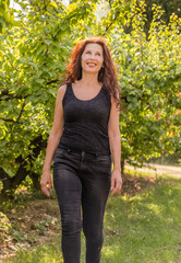woman in apple orchard
