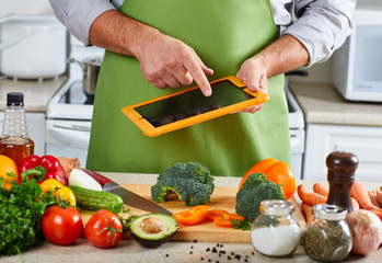 Chef man cooking in the kitchen.