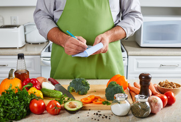 Chef man cooking in the kitchen.
