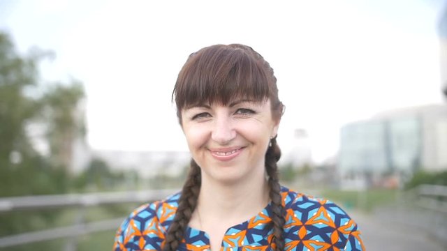 Portrait of a Woman Looking at the Camera and Smiling Slow Motion