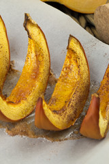 Pumpkin slices baked with cinnamon and sugar. Thanksgiving dinner. Fall harvest. Fall festival.