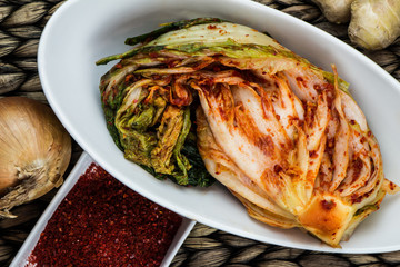 Korean traditional food. Napa kimchi. Fresh and spicy dish. Hot and spicy kimchi.