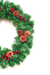 Fototapeta na wymiar pine cone on Christmas wreath with white background
