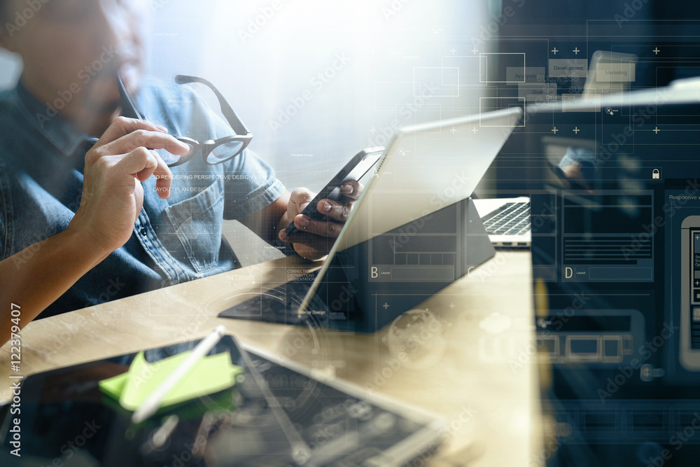 Poster website designer working digital tablet and computer laptop with