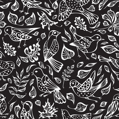 Naklejka premium Vector seamless pattern of birds and leaves.