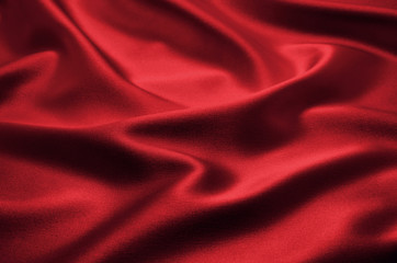 red satin or silk fabric as background