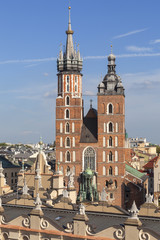 Fototapeta na wymiar Towers of St. Mary's Basilica on Main Market Square, Krakow, Poland