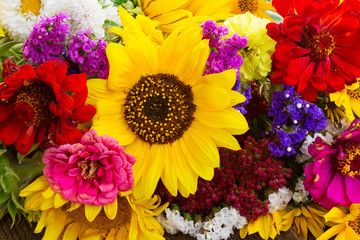 Bright bouquet with fresh fall flowers close up background